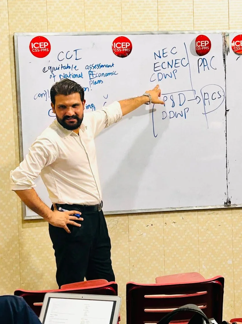 ICEP Classroom ICEP mentor explaining constitutional concepts on the whiteboard